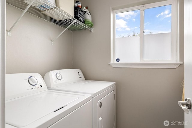 laundry area featuring washer and dryer and laundry area