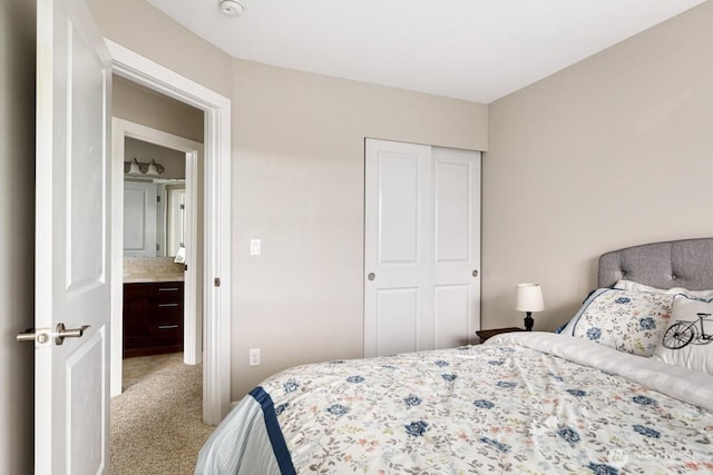 bedroom with a closet and carpet