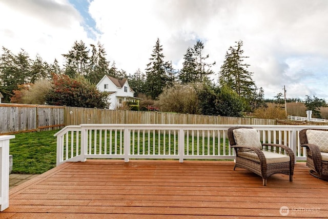 deck featuring a fenced backyard