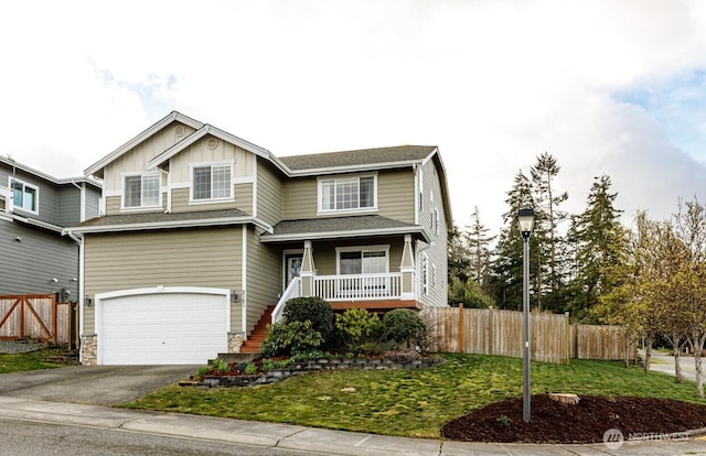 view of front of home featuring stairway, fence, an attached garage, covered porch, and aphalt driveway