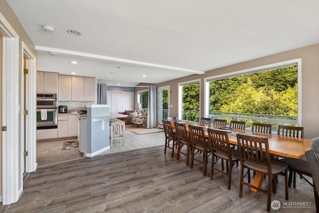 dining room featuring recessed lighting and wood finished floors