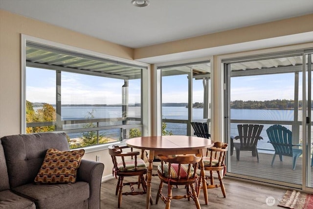 sunroom with a water view