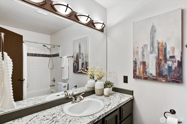 full bathroom featuring toilet, vanity, and shower / tub combo with curtain