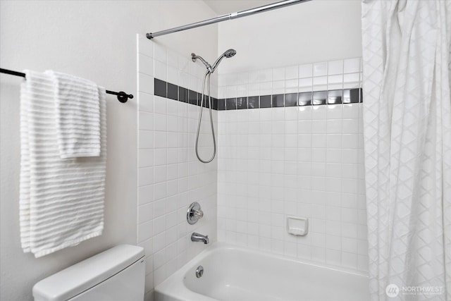 full bathroom with toilet and shower / tub combo with curtain