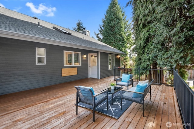 wooden deck with an outdoor hangout area