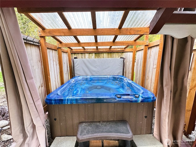 view of patio featuring a hot tub and grilling area