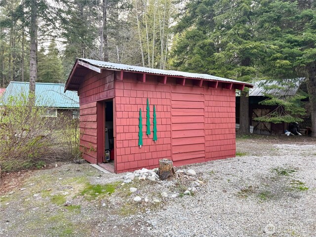 2254 Riffle Dr, Leavenworth, WA 98826 - view of shed with a view of trees
