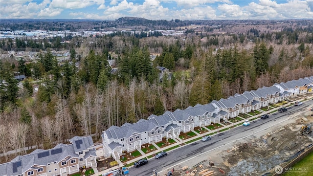 drone / aerial view with a forest view