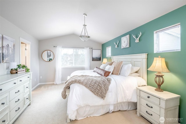 bedroom with light carpet, baseboards, and vaulted ceiling