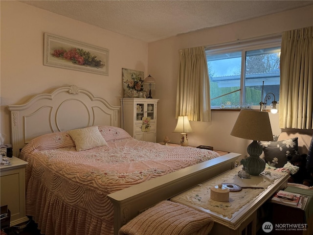 bedroom featuring a textured ceiling