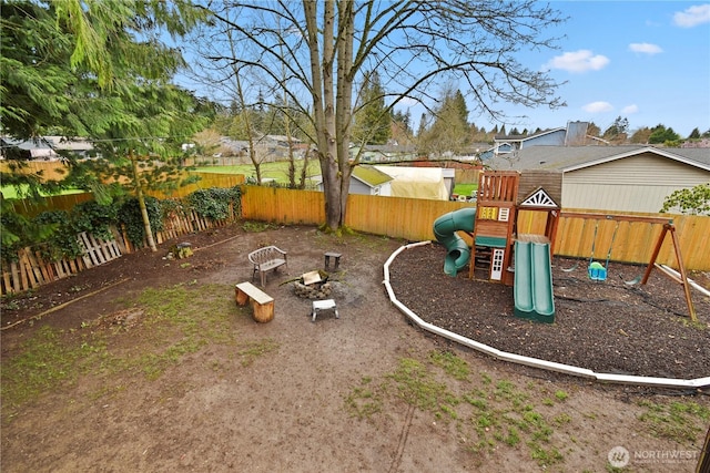 view of play area with a fenced backyard