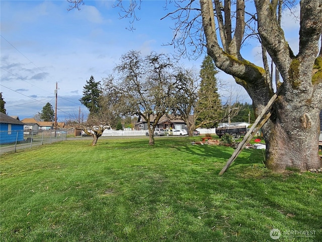 view of yard with fence