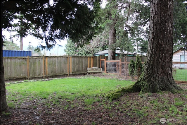 view of yard featuring a fenced backyard