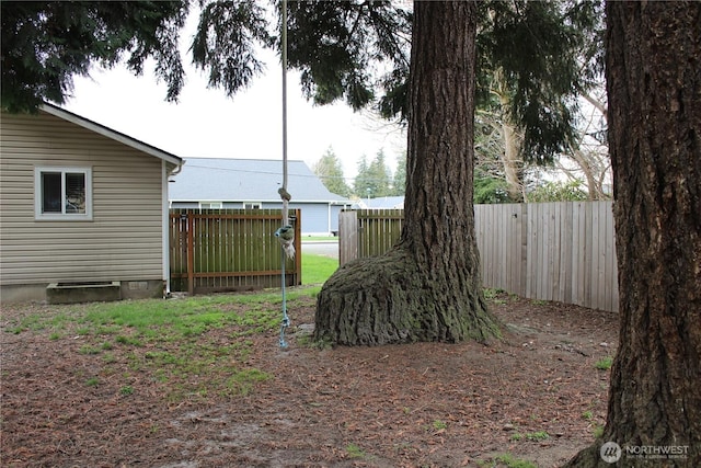 view of yard featuring a fenced backyard