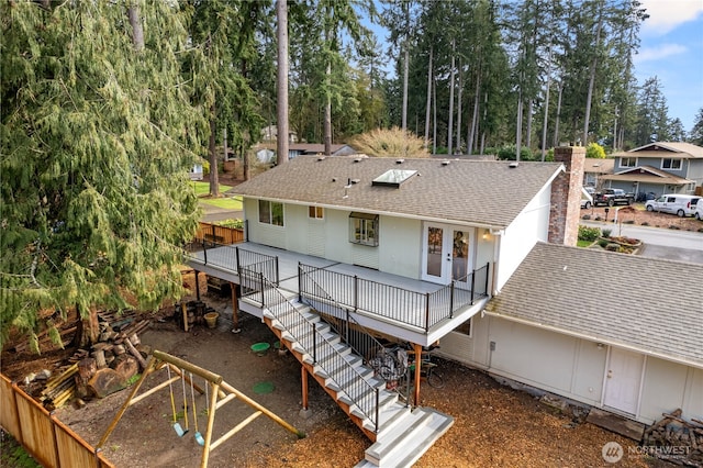 315 Point Fosdick Pl NW, Gig Harbor, WA 98335 - back of property featuring a wooden deck, stairs, and a shingled roof