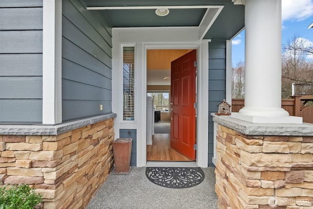 entrance to property with stone siding