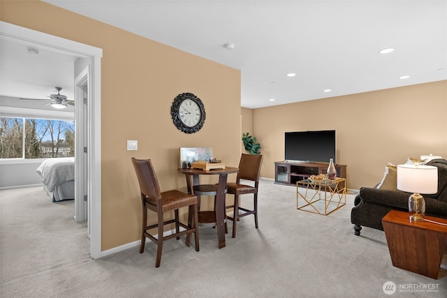 dining room with carpet flooring, recessed lighting, baseboards, and a ceiling fan