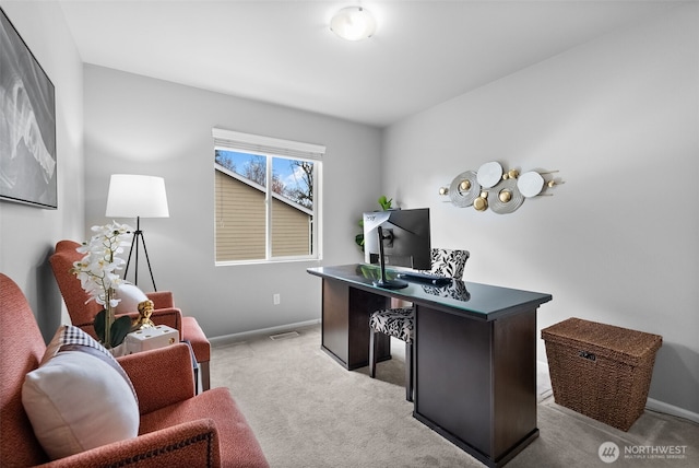 home office featuring visible vents, baseboards, and carpet