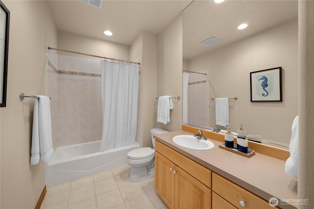 full bath featuring visible vents, toilet, shower / bath combo with shower curtain, tile patterned floors, and vanity