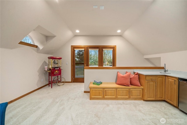 living area with recessed lighting, baseboards, lofted ceiling, and light carpet