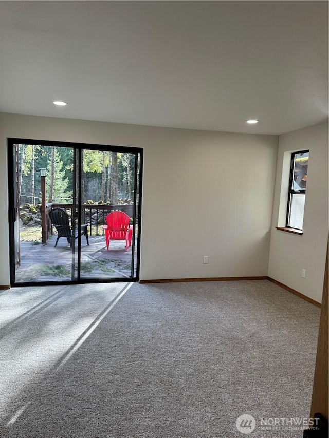 unfurnished room featuring carpet flooring, recessed lighting, and baseboards