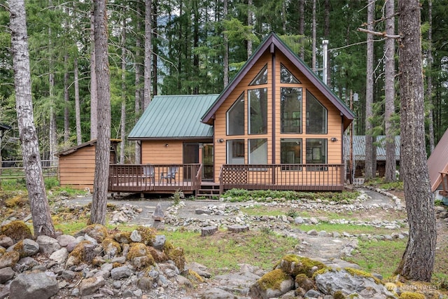 213 Crescent Beach Dr, Packwood, WA 98361 - rear view of house with a deck and metal roof