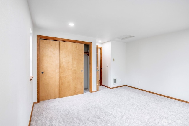 213 Crescent Beach Dr, Packwood, WA 98361 - unfurnished bedroom featuring recessed lighting, visible vents, a closet, baseboards, and light colored carpet