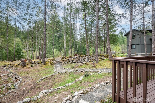 213 Crescent Beach Dr, Packwood, WA 98361 - view of yard with a wooden deck