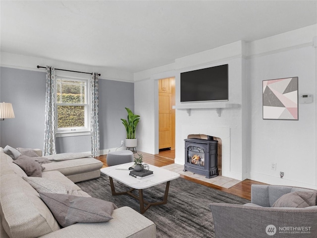 living room with light wood finished floors and baseboards