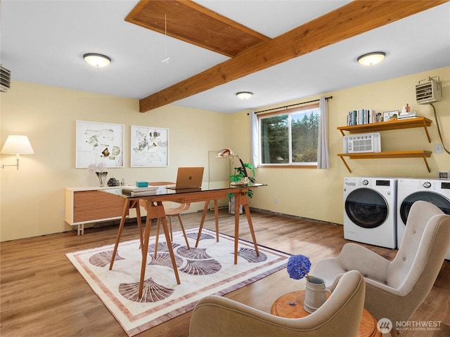 office with attic access, beamed ceiling, wood finished floors, and washing machine and clothes dryer