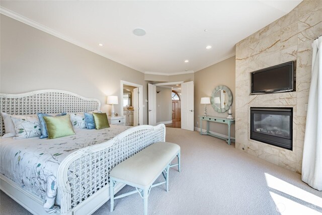 5685 Nakat Way, Blaine, WA 98230 - carpeted bedroom with ornamental molding, a fireplace, and recessed lighting