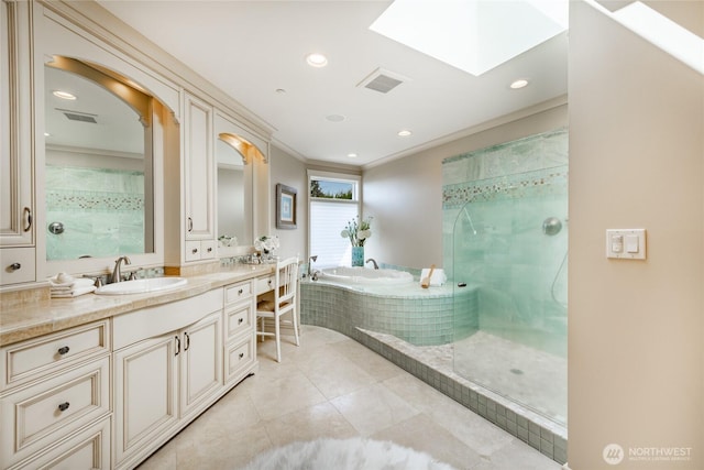 5685 Nakat Way, Blaine, WA 98230 - bathroom featuring a skylight, tiled shower, a bath, tile patterned floors, and vanity