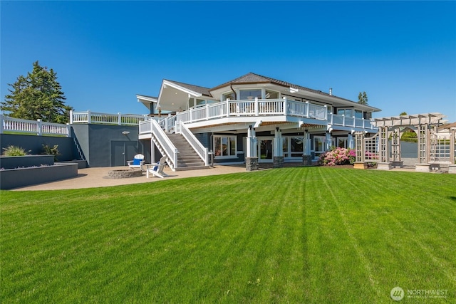 5685 Nakat Way, Blaine, WA 98230 - back of house featuring stairs, a fire pit, a wooden deck, a patio, and a pergola