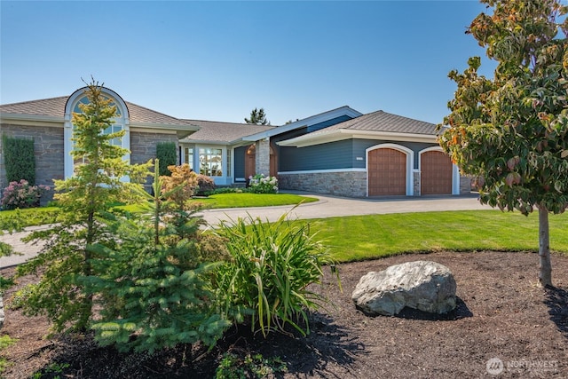 5685 Nakat Way, Blaine, WA 98230 - view of front facade featuring an attached garage, stone siding, driveway, and a front yard
