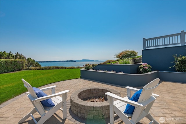 5685 Nakat Way, Blaine, WA 98230 - view of patio / terrace with a water view and a fire pit