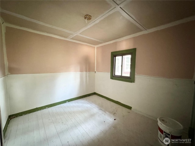 empty room with hardwood / wood-style floors