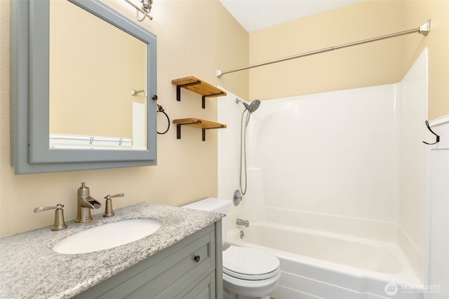 full bath with vanity, shower / bathing tub combination, and toilet