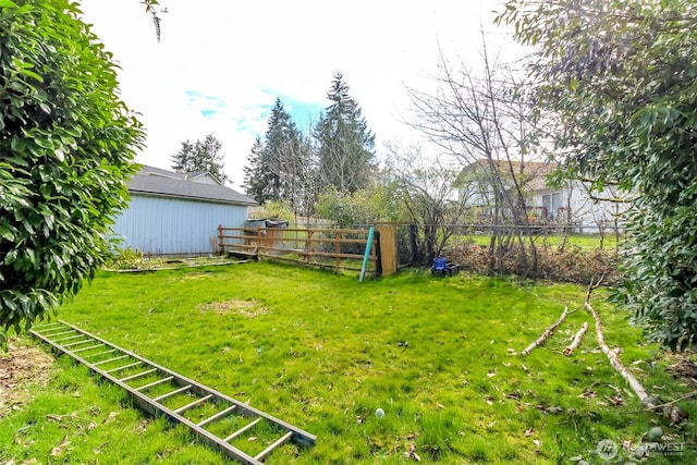 view of yard with fence