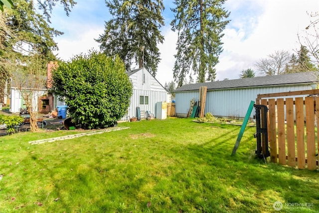 view of yard featuring fence