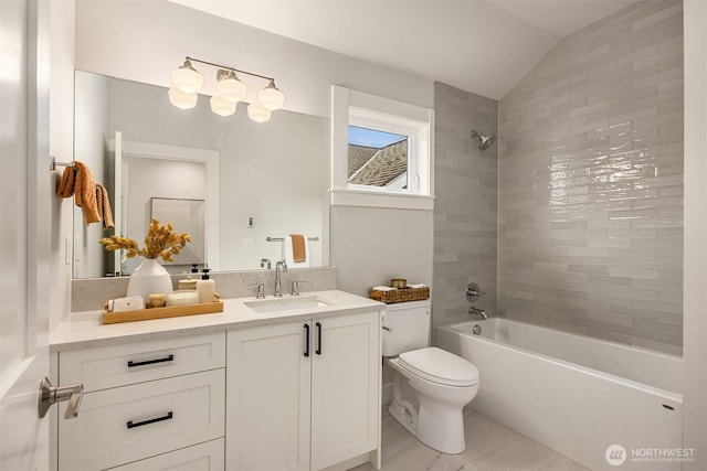 full bath featuring shower / tub combination, toilet, vanity, and lofted ceiling