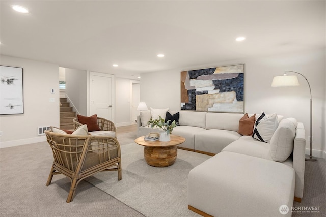 living room featuring visible vents, recessed lighting, stairway, carpet floors, and baseboards