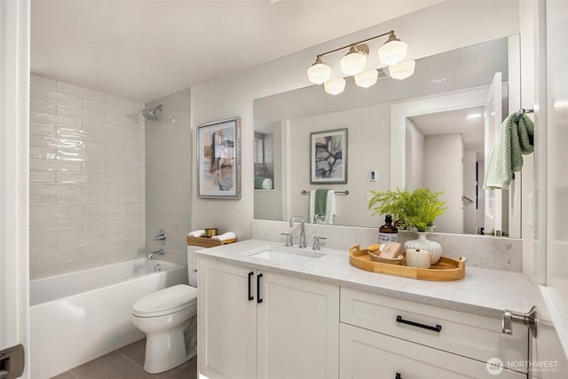 full bathroom with vanity,  shower combination, toilet, and tile patterned flooring