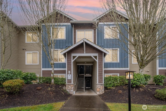 view of front facade featuring stone siding