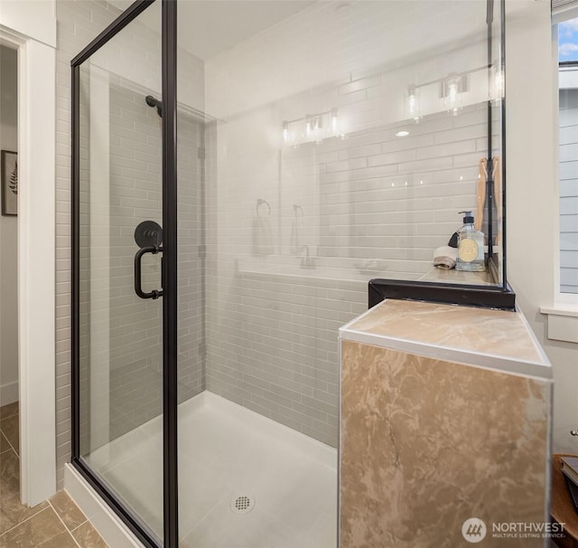 bathroom with a shower stall