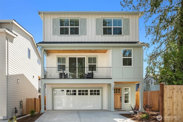 20 160th St SE, Bothell, WA 98012 - view of front of home with board and batten siding, concrete driveway, a balcony, and a garage