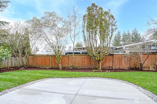 view of patio featuring fence