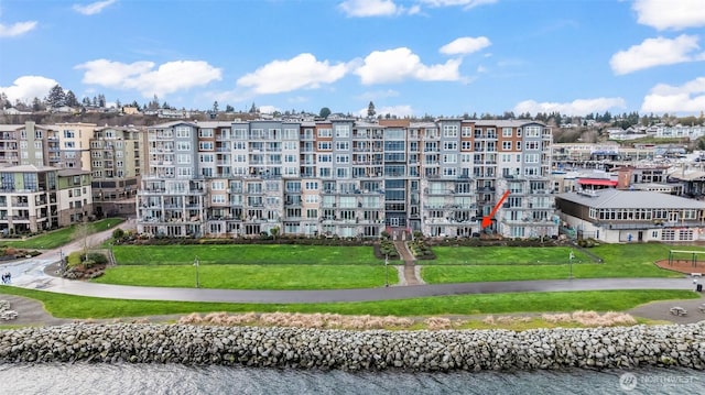 view of building exterior featuring a water view