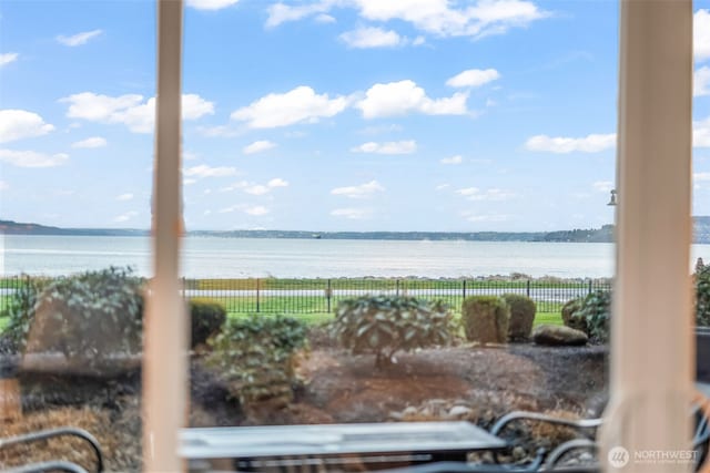 view of water feature with fence