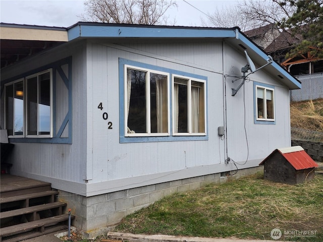 view of property exterior featuring crawl space