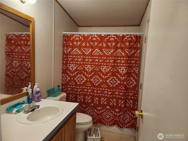 bathroom featuring vanity, a shower with shower curtain, ornamental molding, tile patterned floors, and toilet